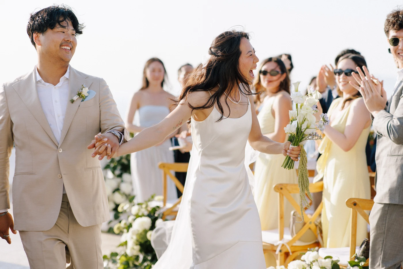 Julia and Jason celebrating their recessional at Grand Miramar Puerto Vallarta wedding