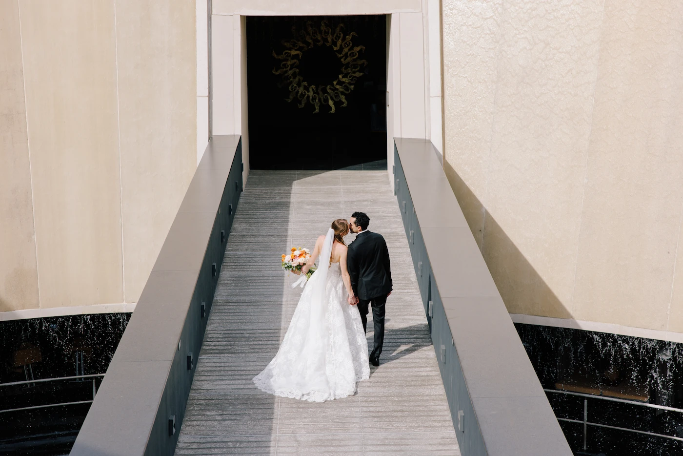 Kat and Sep wedding portrait on architectural stairs at Dreams Bahia Mita Riviera Nayarit