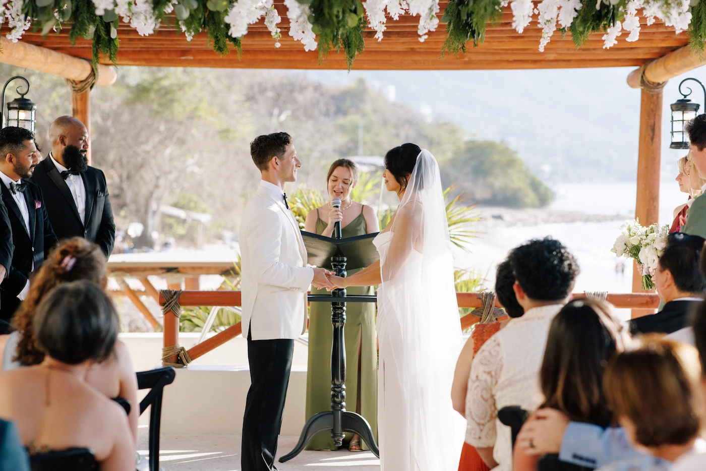 Natasha and Jesse outdoor wedding ceremony with Banderas Bay view at Hotel Playa Fiesta