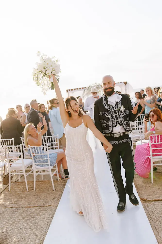 Evgenia Kostiaeva photographing a wedding in Puerto Vallarta at golden hour