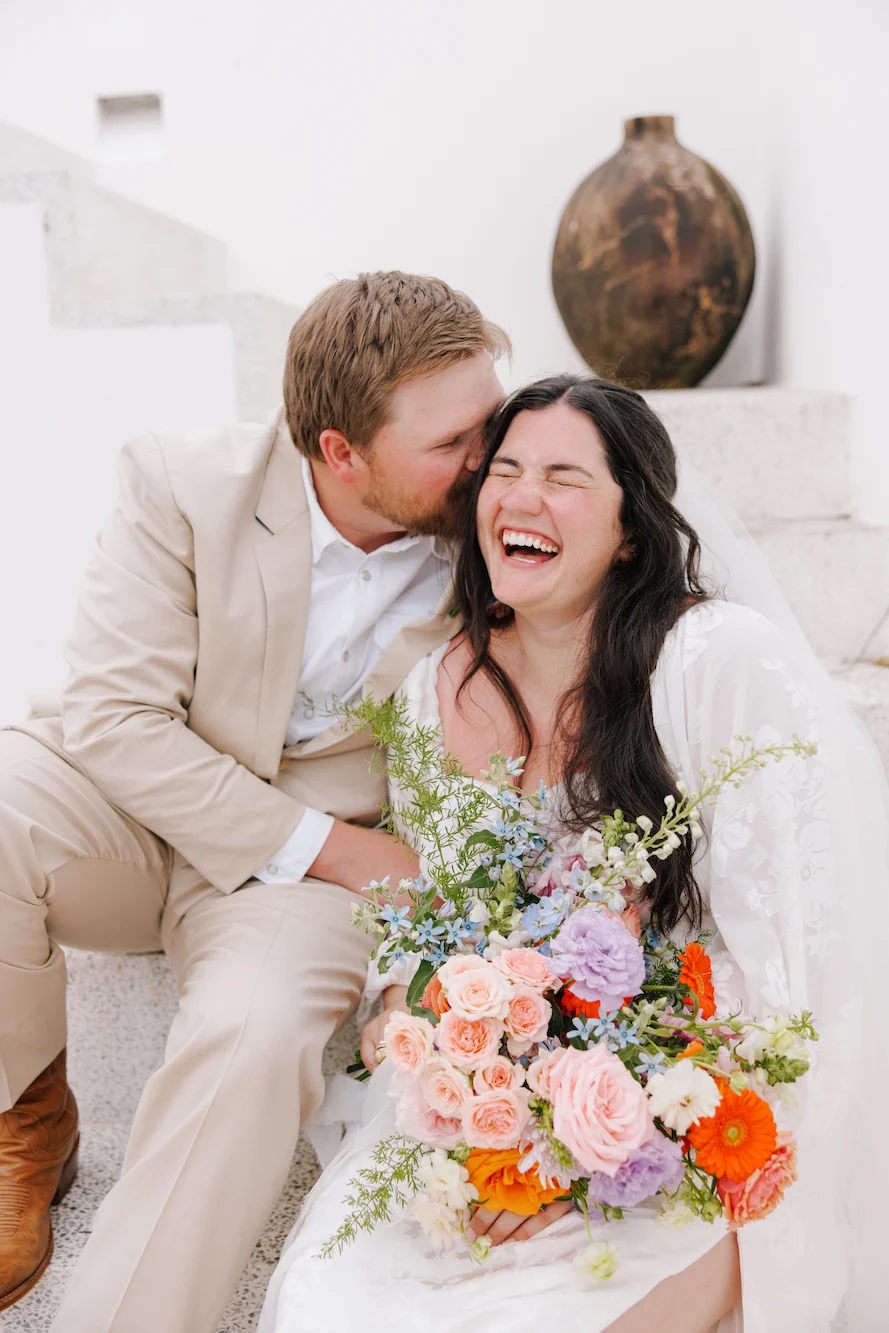 Couple laughing at a private villa wedding in Sayulita Mexico photographed by Evgenia Kostiaeva