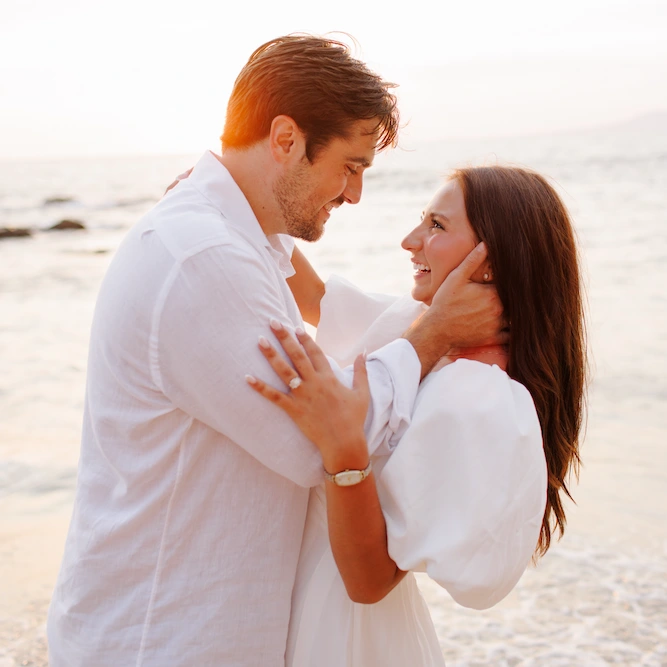 Man proposing to his partner on Conchas Chinas Beach, Puerto Vallarta